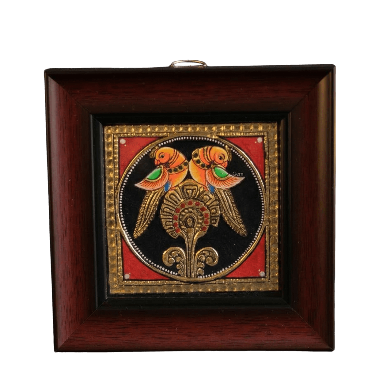 Hand-painted Tanjore painting of two parrots on a golden pedestal with 22K gold foil work and kundan stones in a dark wood frame.