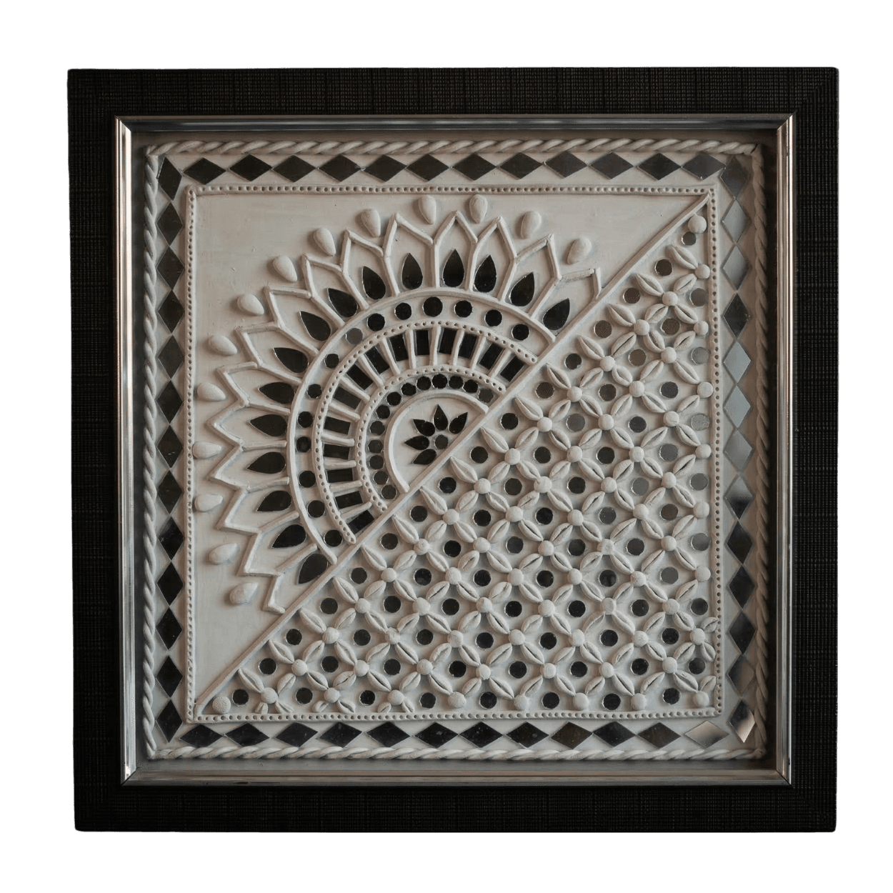 Handcrafted ivory Lippan art mural with geometric clay relief and small mirrors in a dark frame, representing traditional Indian mud and mirror work by Shree Jai Arts.