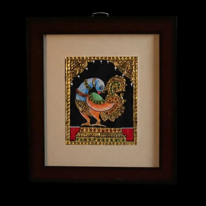 Hand-painted traditional bird motif Tanjore painting with 22K gold foil and kundan stones on a black background in a dark teak wood frame.
