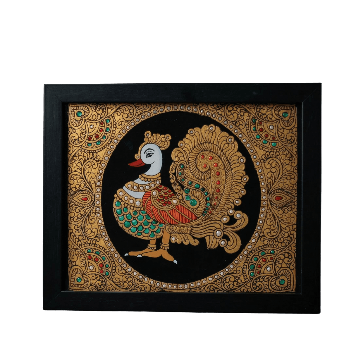 Handmade Annam (mythical swan) reverse glass painting by Shree Jai Arts. The sacred bird is depicted with vibrant green and red details, intricate gold jewelry, and surrounded by an ornate gold floral border against a black background, encased in a premium black frame.