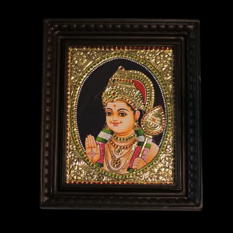 Hand-painted Tanjore painting of Lord Murugan (bust view) with 22K gold foil, featuring an intricate golden crown and oval arch in a dark teak wood mani frame.